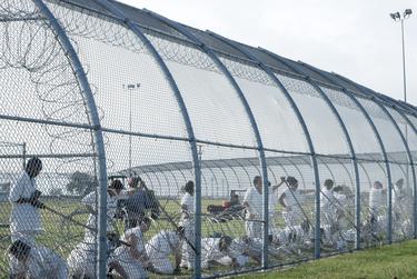 Prisoners work outdoors at the Dr. Lane Murray Unit, a women's prison that's part of the Texas Department of Criminal Justice.