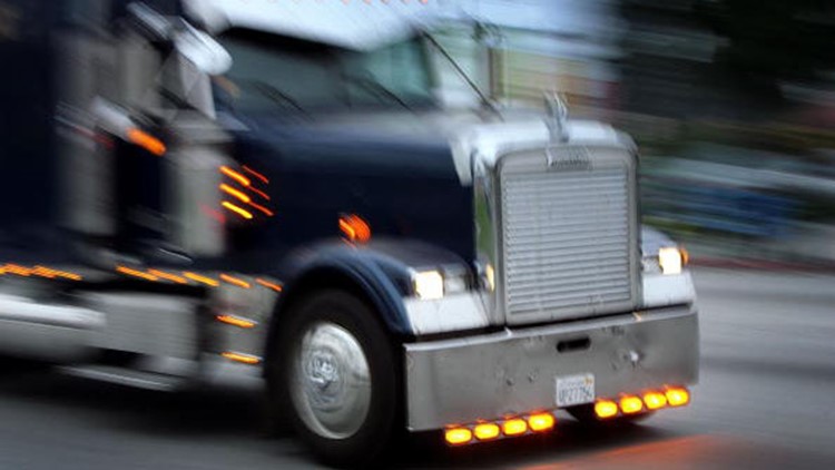 Video: Truck driver escapes moving big rig as it falls off Texas highway overpass