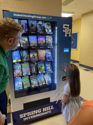 Spring Hill Intermediate Elementary receives donation of book vending machine