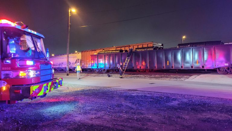 Man trapped for more than 12 hours in train car rescued by firefighters