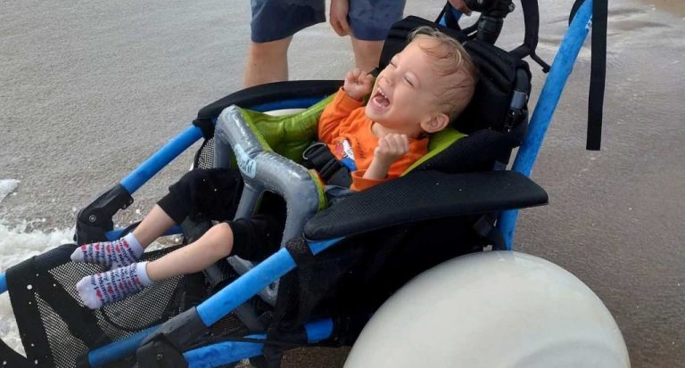 Mom Moved to Tears as Disabled Son Finally Gets to Play in the Sea Thanks to Beach Wheelchair –WATCH