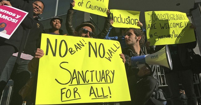 Monday Cartoon: SANCTUARY! He Cries From the Bell Tower. ‘Go Away’ Responds the Priest