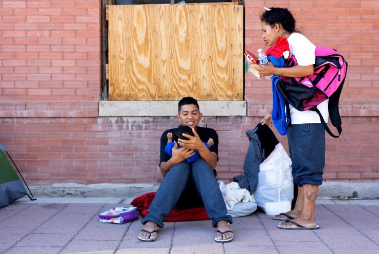 El Paso scrambles to move migrants off the streets and gives them free bus rides as shelters reach capacity