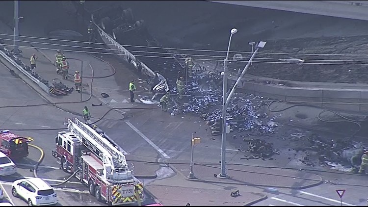 One dead after semi-truck flies off US 75 overpass in Allen