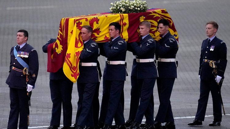 Crowds gather in London to see queen’s coffin procession