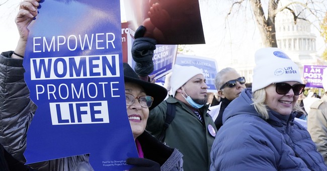 Elderly Woman Shot in the Back While Canvassing Against Abortion Proposal