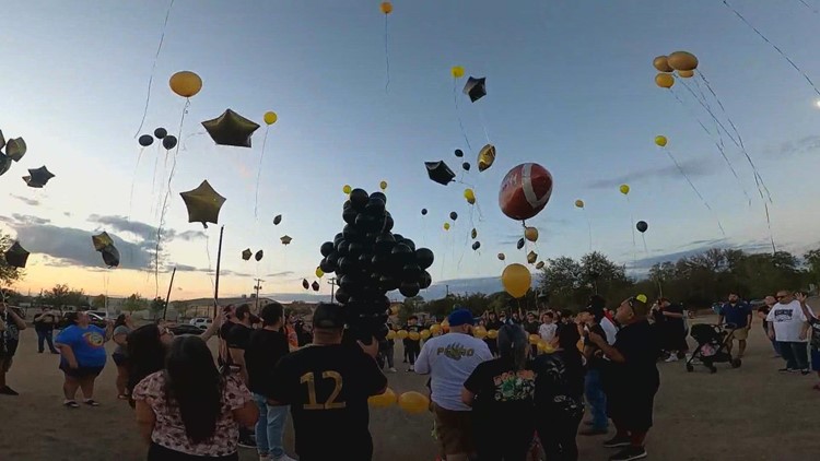 Family, friends remember slain youth football coach with balloon release