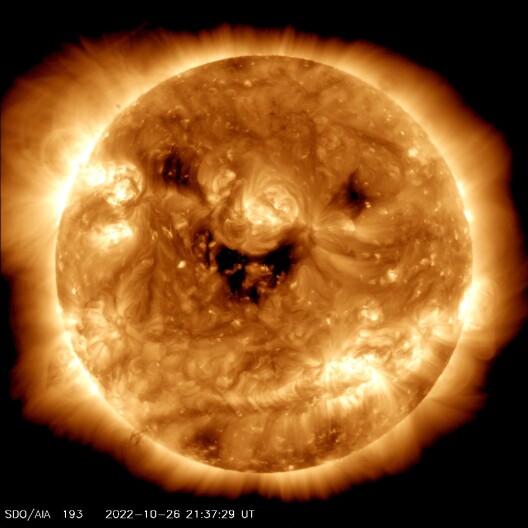 NASA caught the sun smiling down on us, but the grin could signal a solar storm