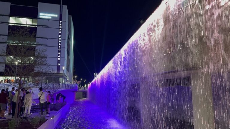 An old concrete ditch in downtown San Antonio has landscaping, walkways, public art