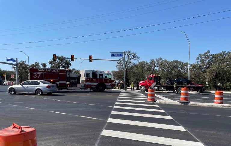 One hospitalized after driver runs red light, crashes on North Side, SAPD says