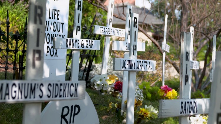 For Halloween, this Dallas couple decorated their yard with a graveyard based on 2022 events