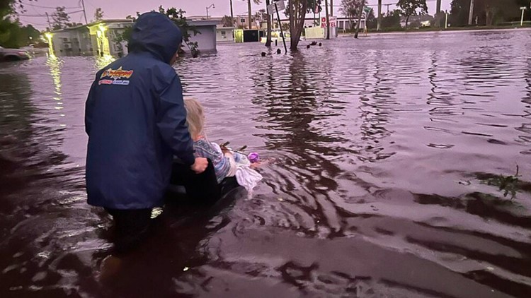 Son’s images show him rescuing Mom from Ian’s floodwaters