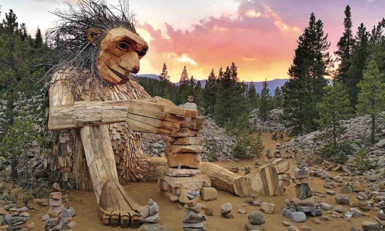 Danish Artist Hides Enormous Trolls in Forests Around the World Using Recycled Wood—LOOK