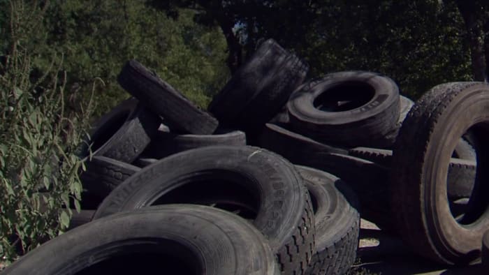 Dozens of tires dumped illegally at empty lot in Northeast Side neighborhood