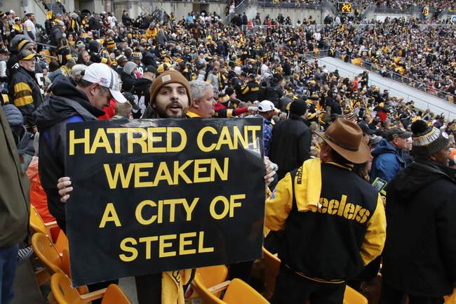 WATCH: Woman Carrying Pro-DJT Sign Rushes Field at Jets-Steelers Game, Trump in Attendance