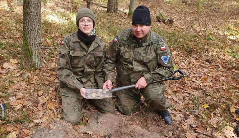 Father-Son Were Trying to Find Roman Road but Found a Shovelful of 16th C. Silver Coins Instead