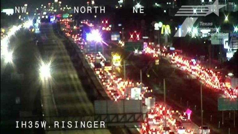 18-wheeler dangling from overpass on I-35W in Fort Worth causes traffic jam Thursday