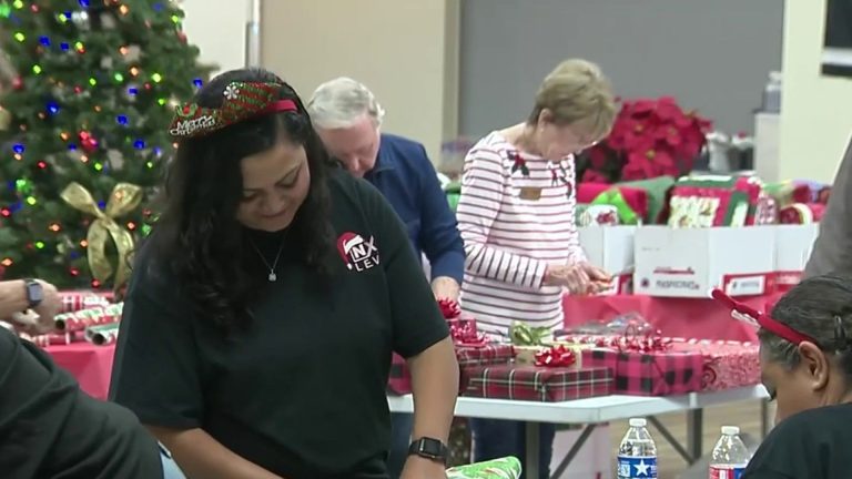 Volunteers raise their sleeves, wrap holiday gifts for Roy Maas Youth Alternatives children