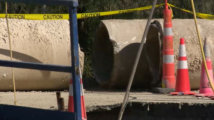 SAWS crews work to repair water leak at North Side intersection