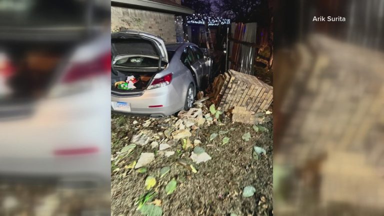 Car narrowly avoids crashing into Fort Worth home