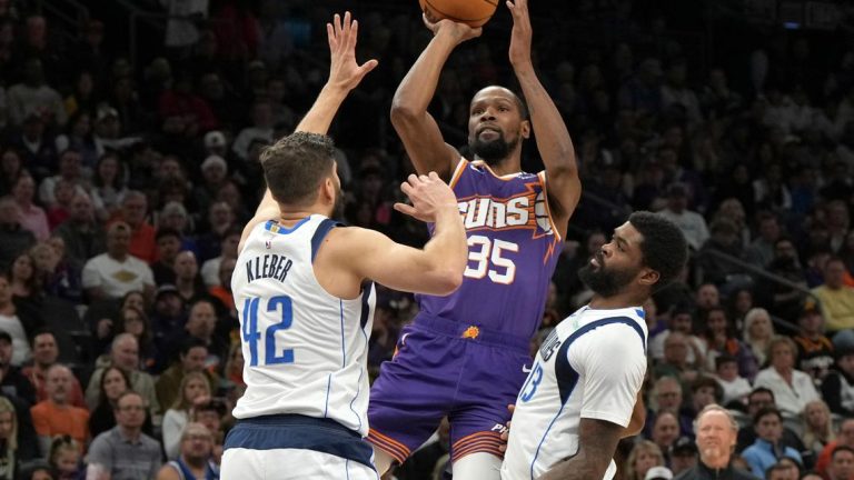 Kyrie Irving scores 20, Mavs win first game after Doncic’s injury by beating the Suns 98-89