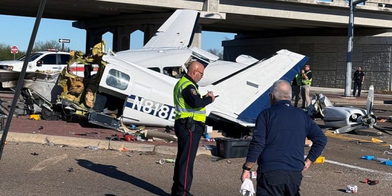 Aftermath of small plane crash onto Texas roadway caught on camera with split fuselage, damaged vehicles